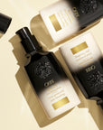 Oribe Balm d'Or Heat nuo karščio plaukus saugojantis serumas
