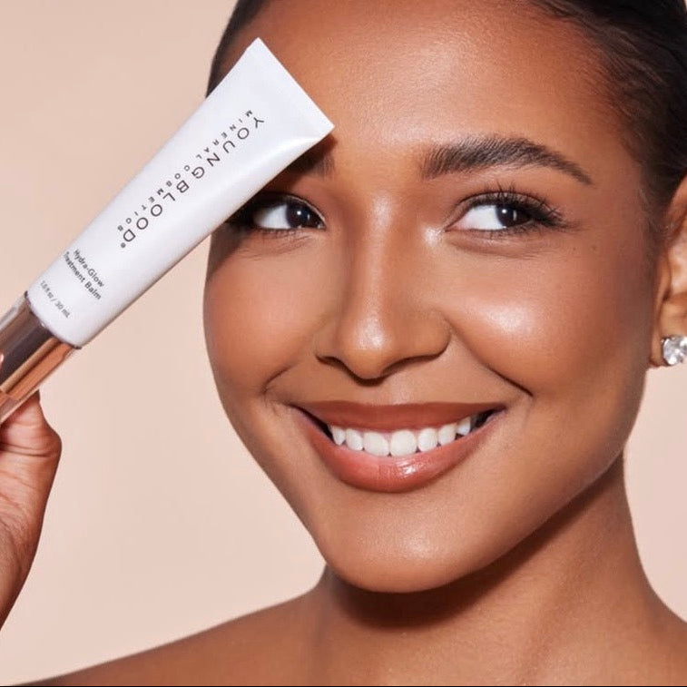 YOUNGBLOOD Žvilgesio suteikianti makiažo bazė ''Hydra-Glow Treatment Balm"