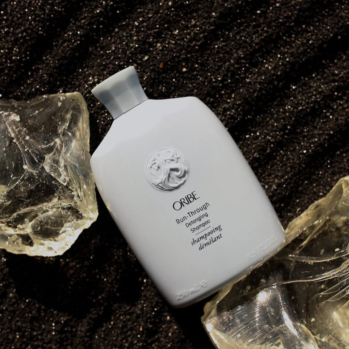 Oribe Run-Through Detangling Shampoo atplaiduojantis besiveliančius plaukus šampūnas