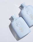 Oribe Run-Through Detangling Shampoo atplaiduojantis besiveliančius plaukus šampūnas