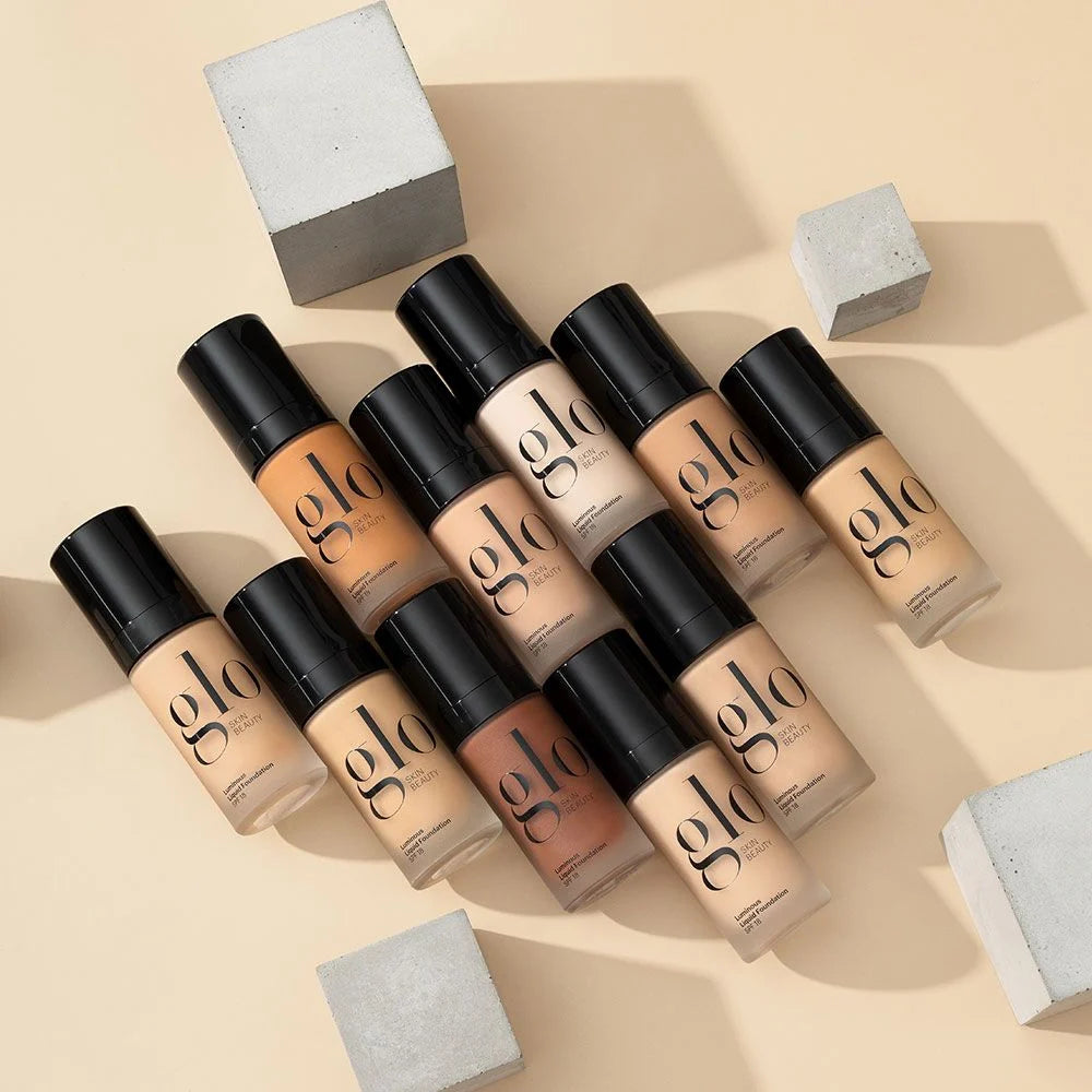 Glo Skin Beauty Liquid Foundation SPF 18 tonuojanti pudra sausai ir normaliai odoms (spalva Naturelle)